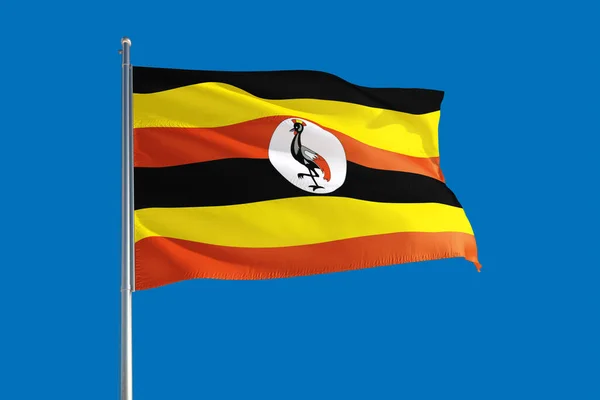 Oeganda Nationale Vlag Wapperend Wind Een Diepblauwe Hemel Hoge Kwaliteit — Stockfoto
