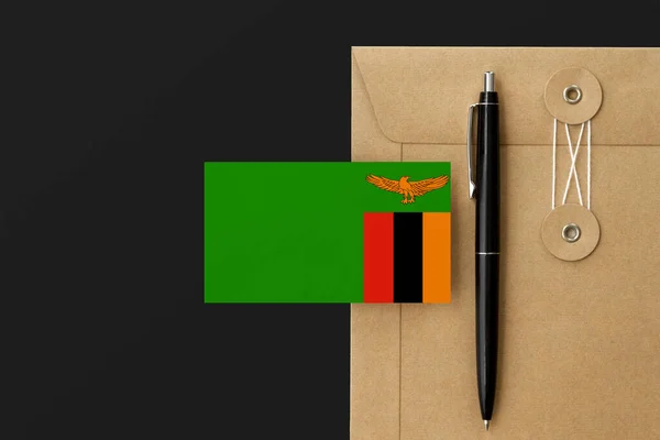 Drapeau Zambie Sur Enveloppe Artisanat Lettre Fond Stylo Noir Concept — Photo