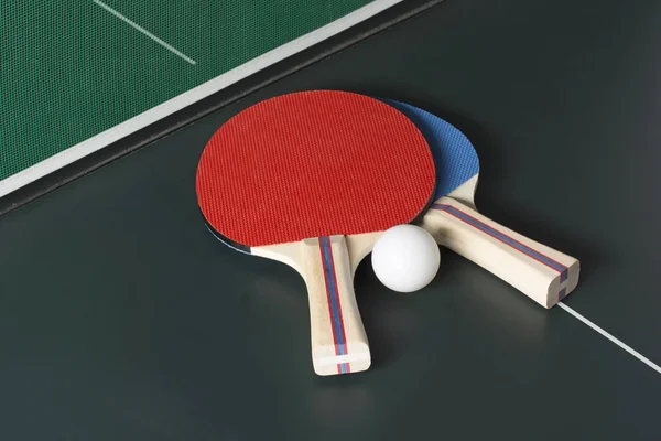 Ping Pong Paddles on Table, both on same side