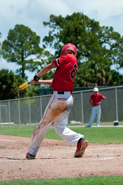 American baseball player swinging bat — Stock Photo, Image