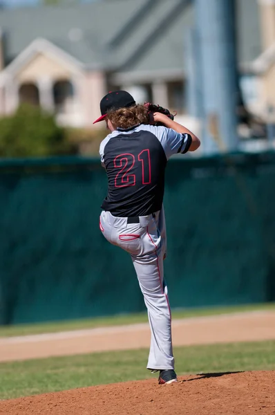 Gymnasiet baseball pitcher — Stock fotografie