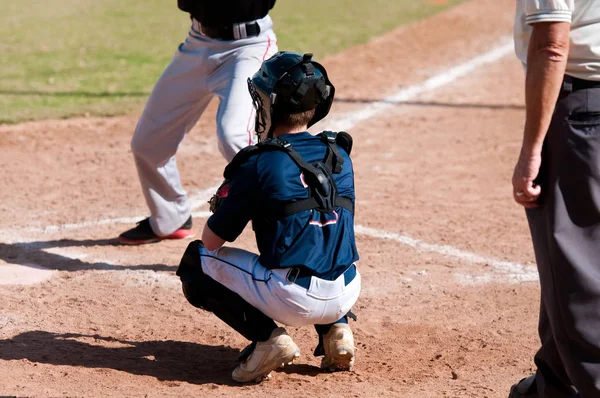 Little league baseball catcher