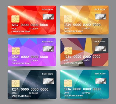 Gerçekçi detaylı kredi kartları ile renkli üçgen tasarım arka plan belirleme.