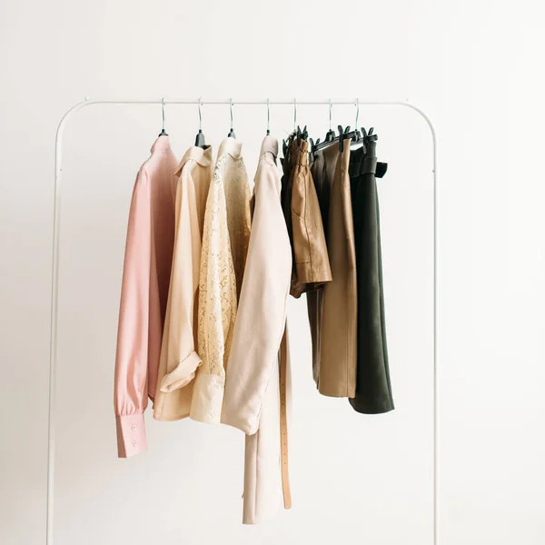 Capsule clothes in beige and pink colors closeup — Stock Photo, Image