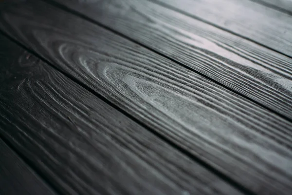 Siyah kabartmalı ahşap doku. Koyu ahşap arka plan. Ahşap dokusunu kapat. Tahtalar.