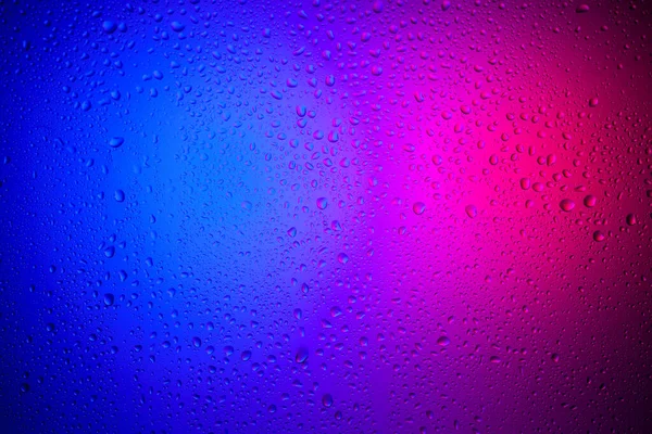 Waterdruppels Glas Rood Blauw Neon Licht Regen Het Glas Tegen — Stockfoto