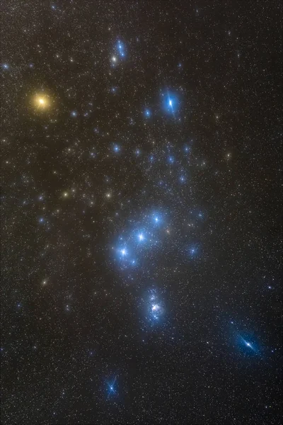 Orion Constellation with the hunter and Orion Nebulae is and amazing place on the universe. In the upper left we can see Betelgeuse a giant red star that is going to explode and create a supernova