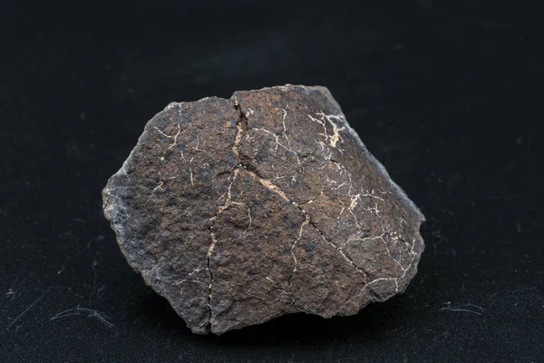 Meteoritenstück Auf Hintergrund — Stockfoto