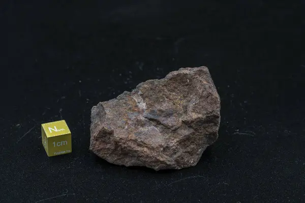 Meteoritenstück Auf Hintergrund — Stockfoto