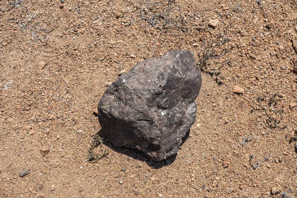 Chondrite Meteorite L Type, a piece of rock formed in outer space in the early stages of Solar System as asteroids. This meteorite comes from a meteorite fall impacting the Earth at Atacama Desert