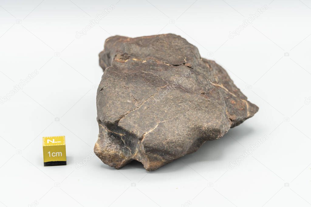 piece of meteorite isolated on white background