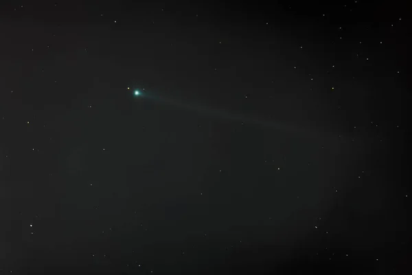 Comet Swan C/2020 F8 as seen from the polluted Santiago de Chile city night sky. We can see the bright comet nucleus, the coma and a small tail moving in between the night stars with an awe high speed