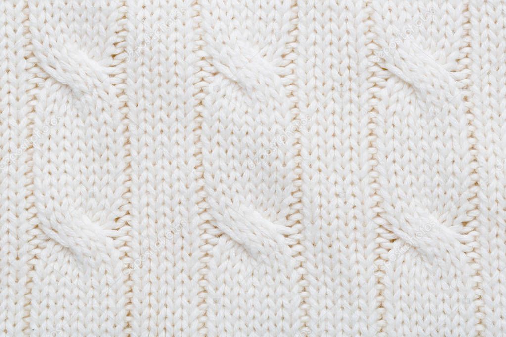 White/ecru knitted woolen fabric 