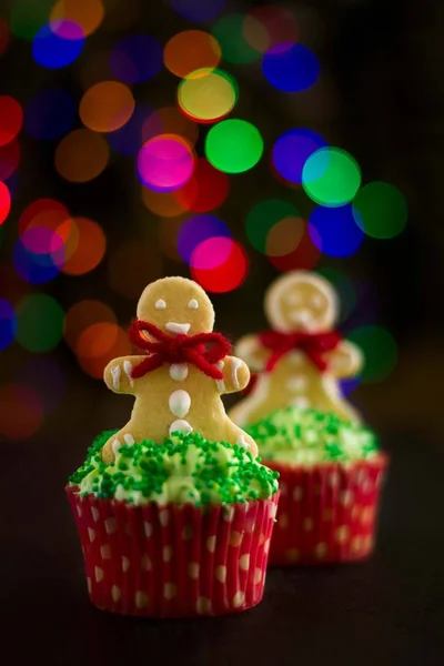 Christmas cupcakes with christmas tree shape and gingerbread men