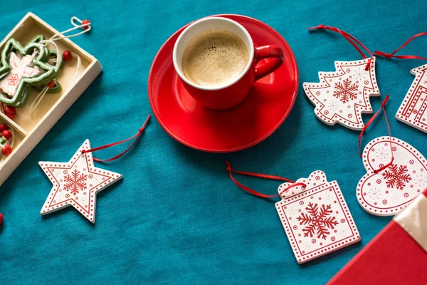 Preparing for Christmas. Red objects on turquoise background. Space for copy. Top view — Stock Photo, Image