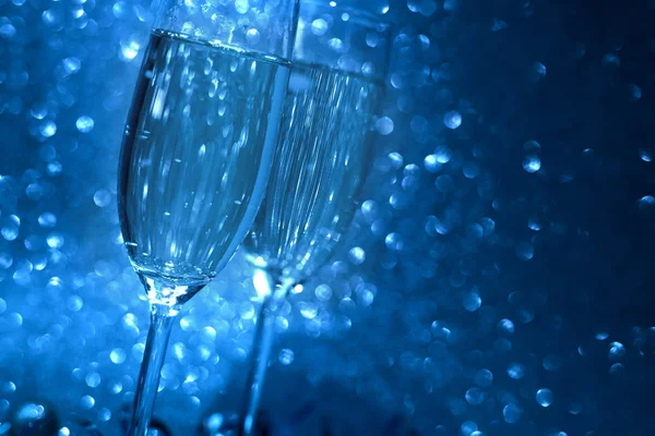 Two Glasses Champagne Blue Glittering Background Christmas New Year Holidays — Stock Photo, Image