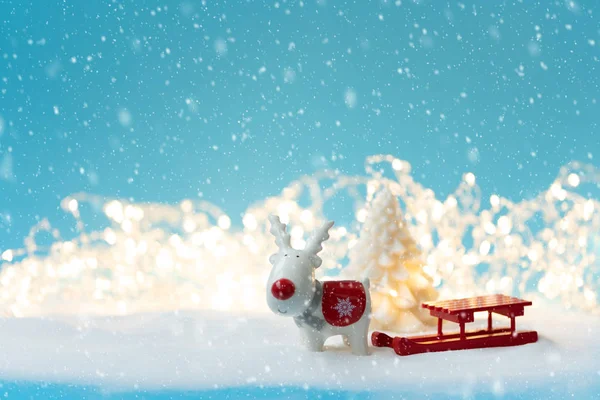 Ceramic Christmas Reindeer Toy Fir Tree Candle Sled Snowy Defocused — Stock Photo, Image