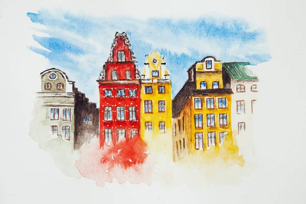 Watercolor drawing of an old town isolated on the white background. Illustration of colorful old buildings, houses.