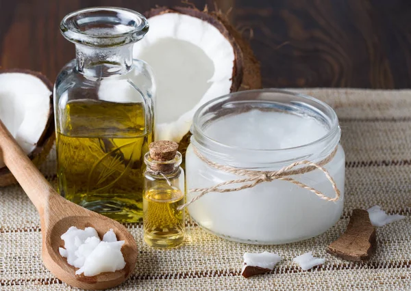 Coconut oil,essential oil, and fresh coconut — Stock Photo, Image