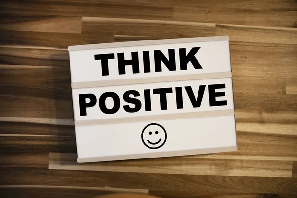 Lightbox Light Box Happy Smiley Message Think Positive Wooden Table — Stock Photo, Image