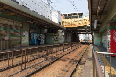 Osaka, Japonya - 19 Mar 2017: Shin Imamiya Ekimae, Shin Imamiya Ekimae istasyonu bir Hankai tramvay Hankai satırındaki durağım.