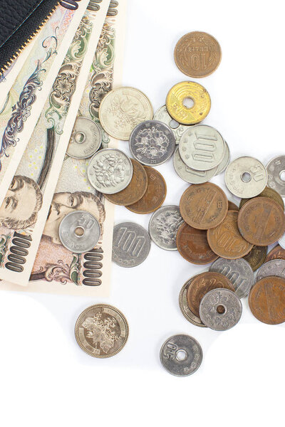 Close up of Japanese yen banknotes and coins