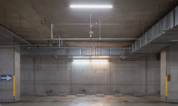 Parking garage underground interior with neon lights