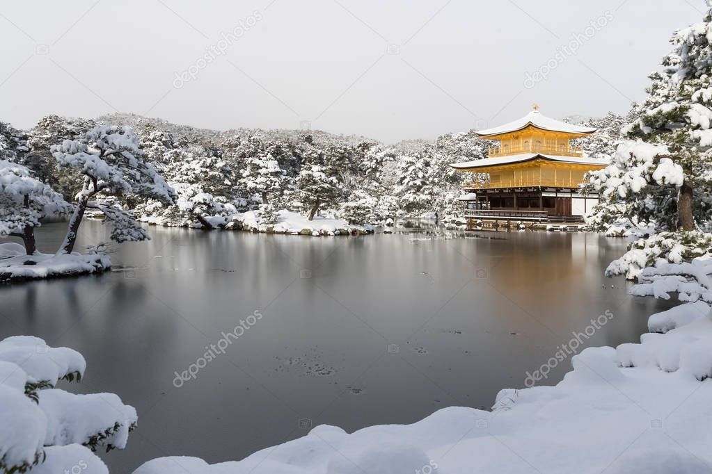 Zen temple Kinkakuji ( Golden Pavilion ) with snow fall in winter 2017, Japan.