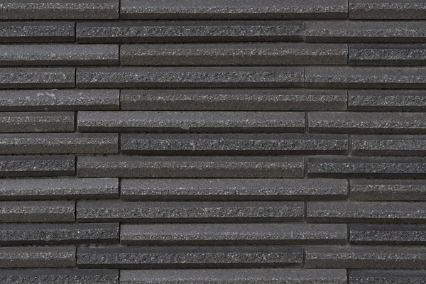 Moderna Pietra Nera Blocco Muro Sfondo — Foto Stock