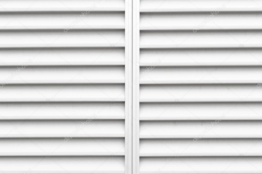 Close-up white shutter window as background
