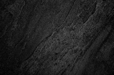 Siyah taş, dokuyu ve arkaplanı kaplar