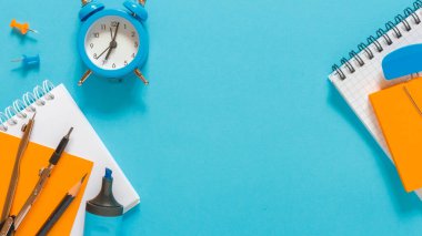 Back to school design with colorful education items and space for text in the background. School background.