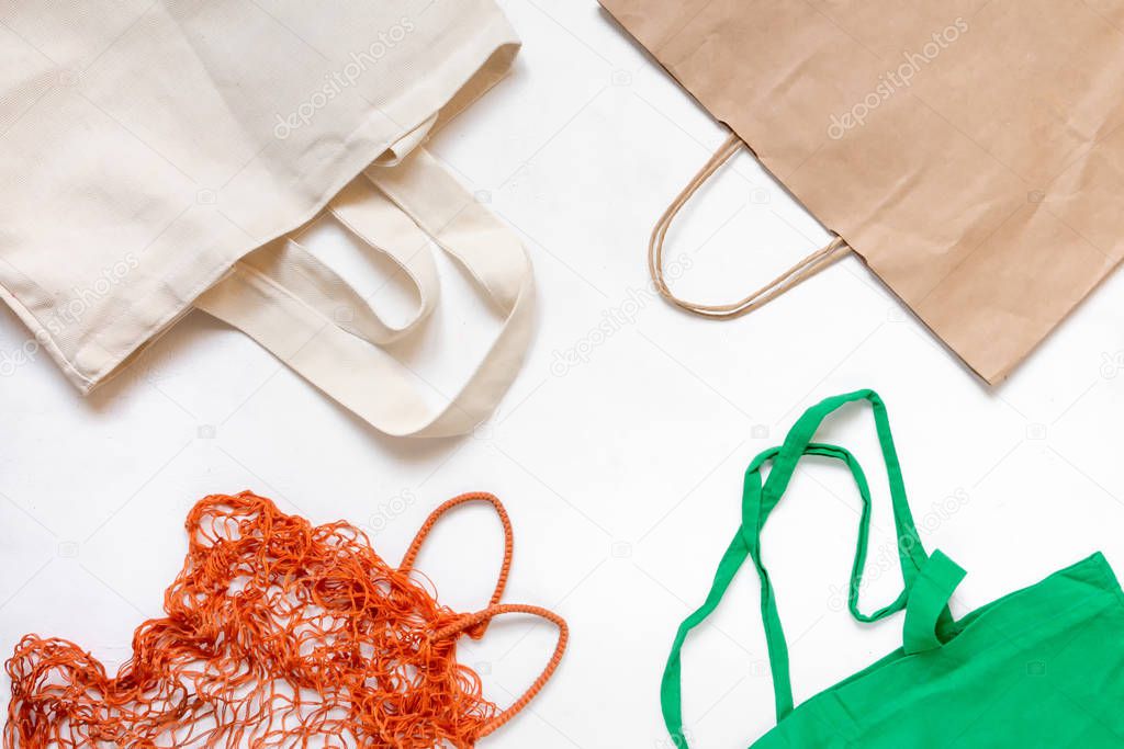 Zero waste concept. Set of Eco-friendly bags, string bags. Copy space, light background.