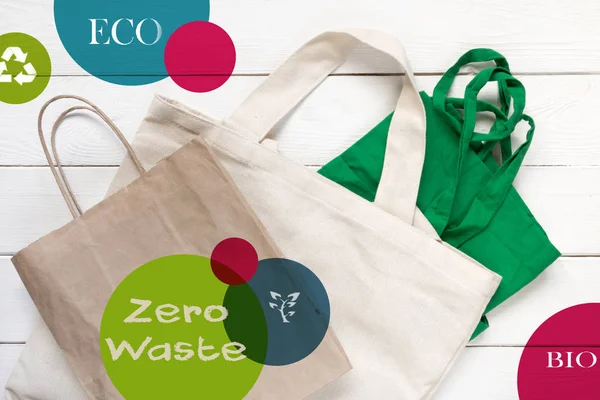 cotton bags and glass gar for free plastic shopping  zero waste wooden background