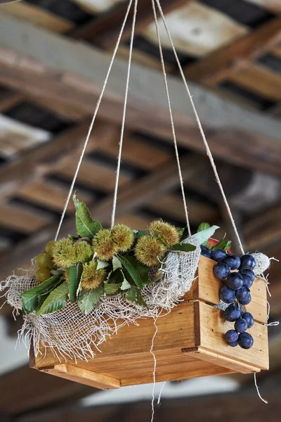 Hanging wooden box with vegetable and flower — Stock Photo, Image