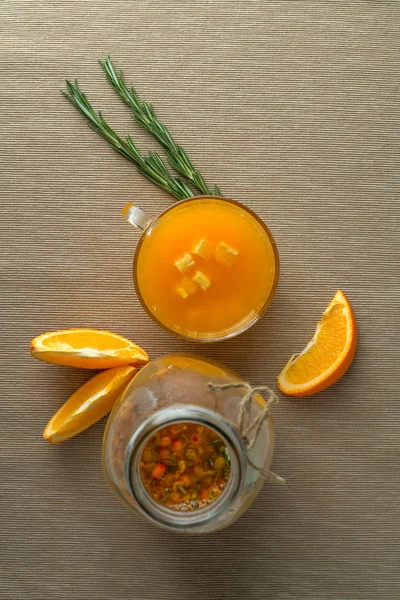 sea buckthorn drink with orange and rosemary