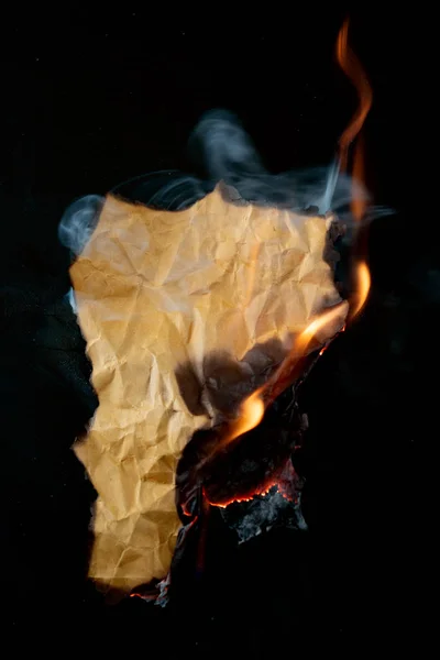 Burning Piece Crumpled Paper Black Background — Stock Photo, Image
