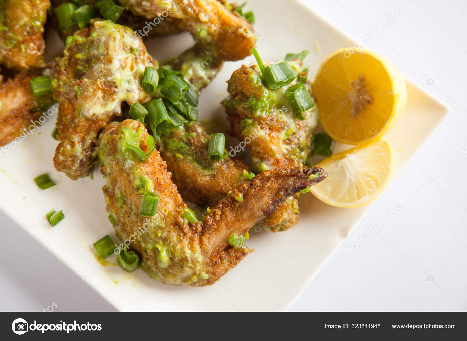Green Chilli Chicken Wings Close Stock Photo by ©YAYImages 323841948