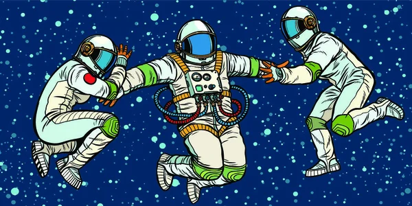 Tři Astronauti Vesmíru Nulové Gravitaci Pop Art Retro Vektor Ilustrační — Stockový vektor