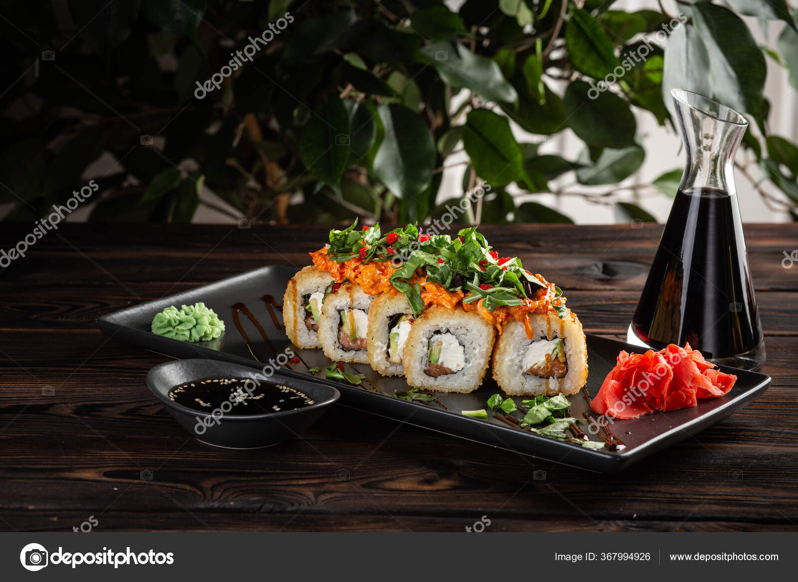 https://st3.depositphotos.com/20528882/36799/i/1600/depositphotos_367994926-stock-photo-sushi-roll-set-plate-soy.jpg