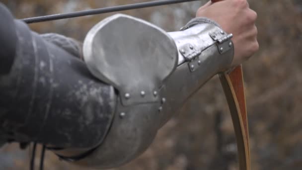 Warrior shoots a bow — Stock Video