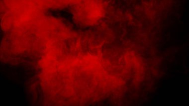 İzole edilmiş siyah arka planda bulanık kırmızı duman. Sisli doku örtüleri.