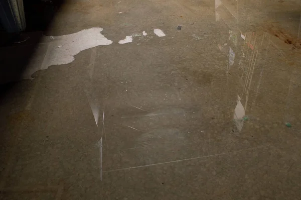 Floodwaters seep into the Missouri basement and lights reflect on the floor which is nearly inundated with water. It will be an expensive repair without insurance. Bokeh. — Stock Image Floodwaters Seep Missouri Basement Lights Reflect Floor Which Nearly Inundated Stock Picture