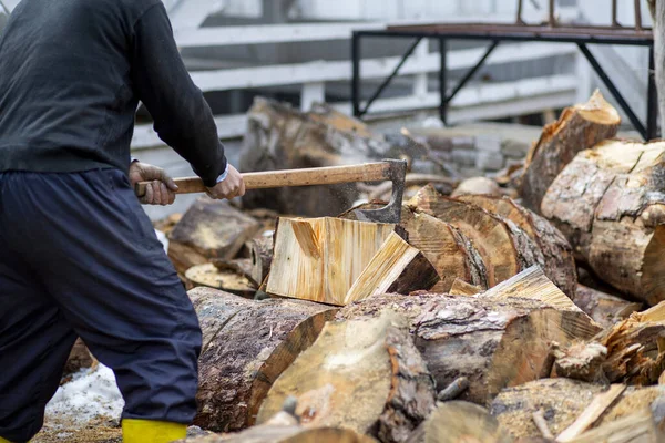 Woodcutters who break wood with an axe in Turkey