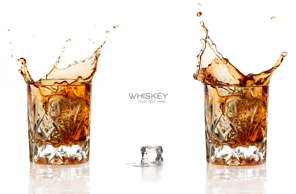 Twee Whiskey Splash geïsoleerd op witte achtergrond — Stockfoto