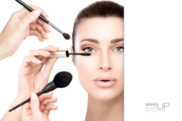 Beauty concept with makeup and cosmetics brushes — Stock Photo, Image