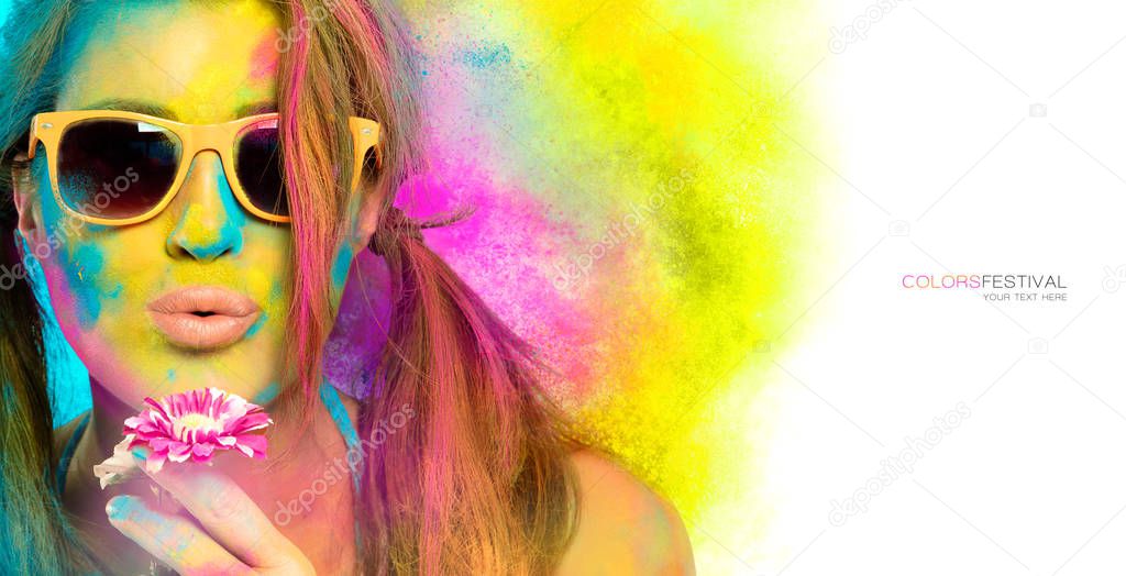 Beautiful young woman covered in rainbow colored powder. Colors 