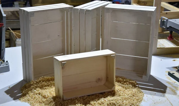 wooden crates and boxes preparing in work shop