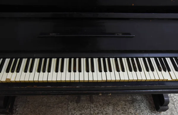 Old vintage piano keyboard instrument