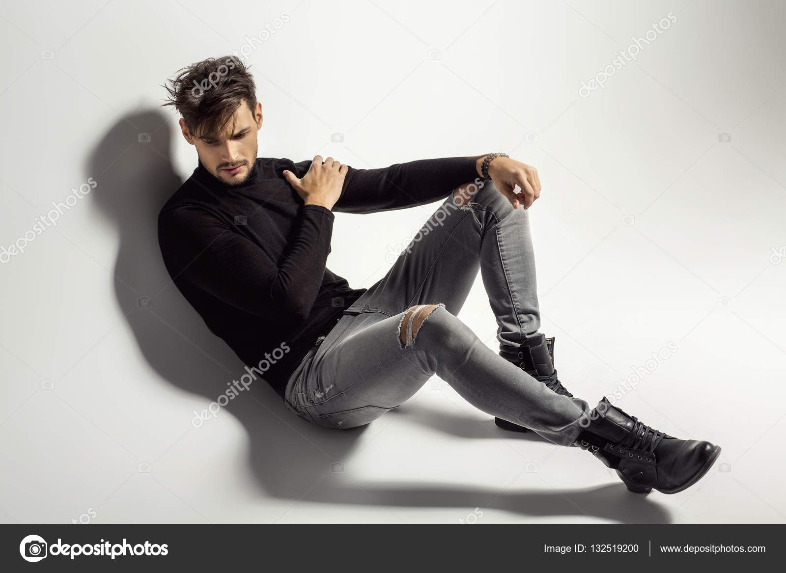Quebec,Canada. A male model poses the runway at the Once Again fashion show  held during the Fashion and Design Festival in Montreal Stock Photo - Alamy